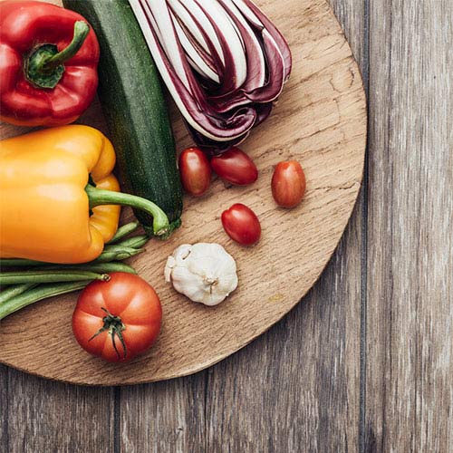 Veggies on a wooden plate